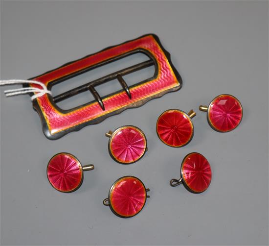 An Edwardian silver and pink enamel buckle with six matching buttons, Deakin & Francis, Birmingham, 1909, buckle 73mm.